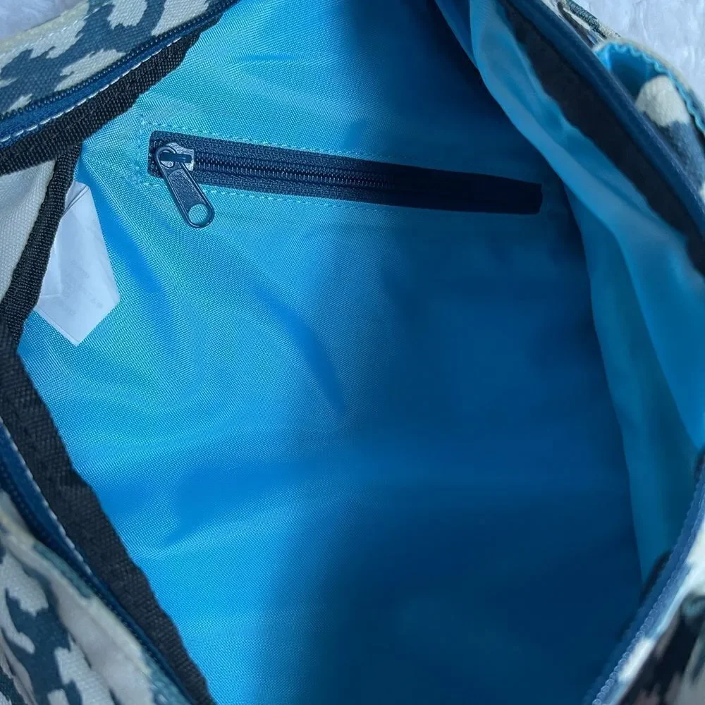 Kavu sling Rope Bag canvas  beige and deep blue blot color padded stitch logo